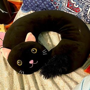 This is a cat neck pillow.